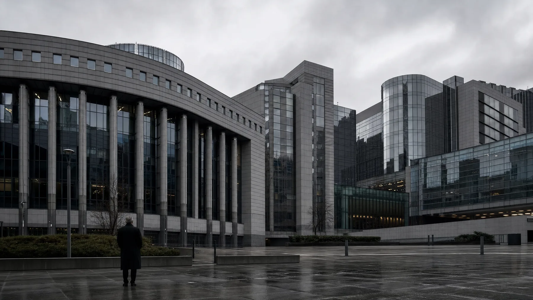 Cold institutional European architecture in Brussels under grey skies