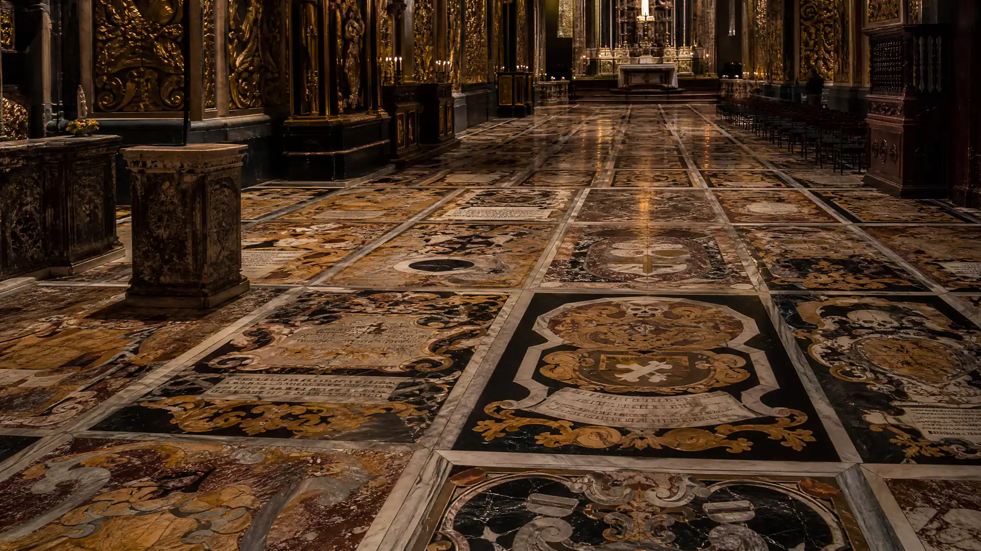 The marble intarsia floor of St John's Co-Cathedral in Valletta, covered with the inlaid tombstones of Knights of the Order of St John.