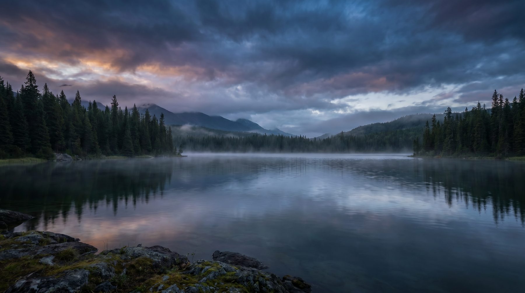 Northern forest and lake at twilight — Canada