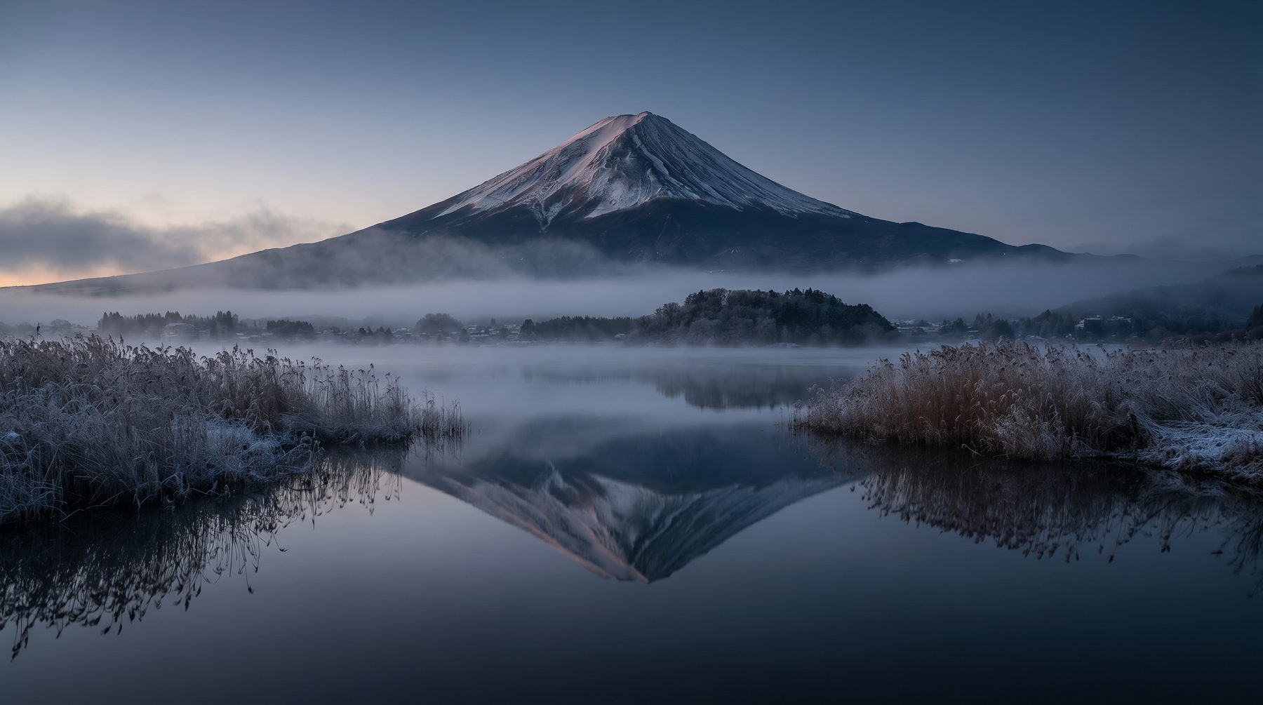 Mount Fuji across a winter lake — Japan