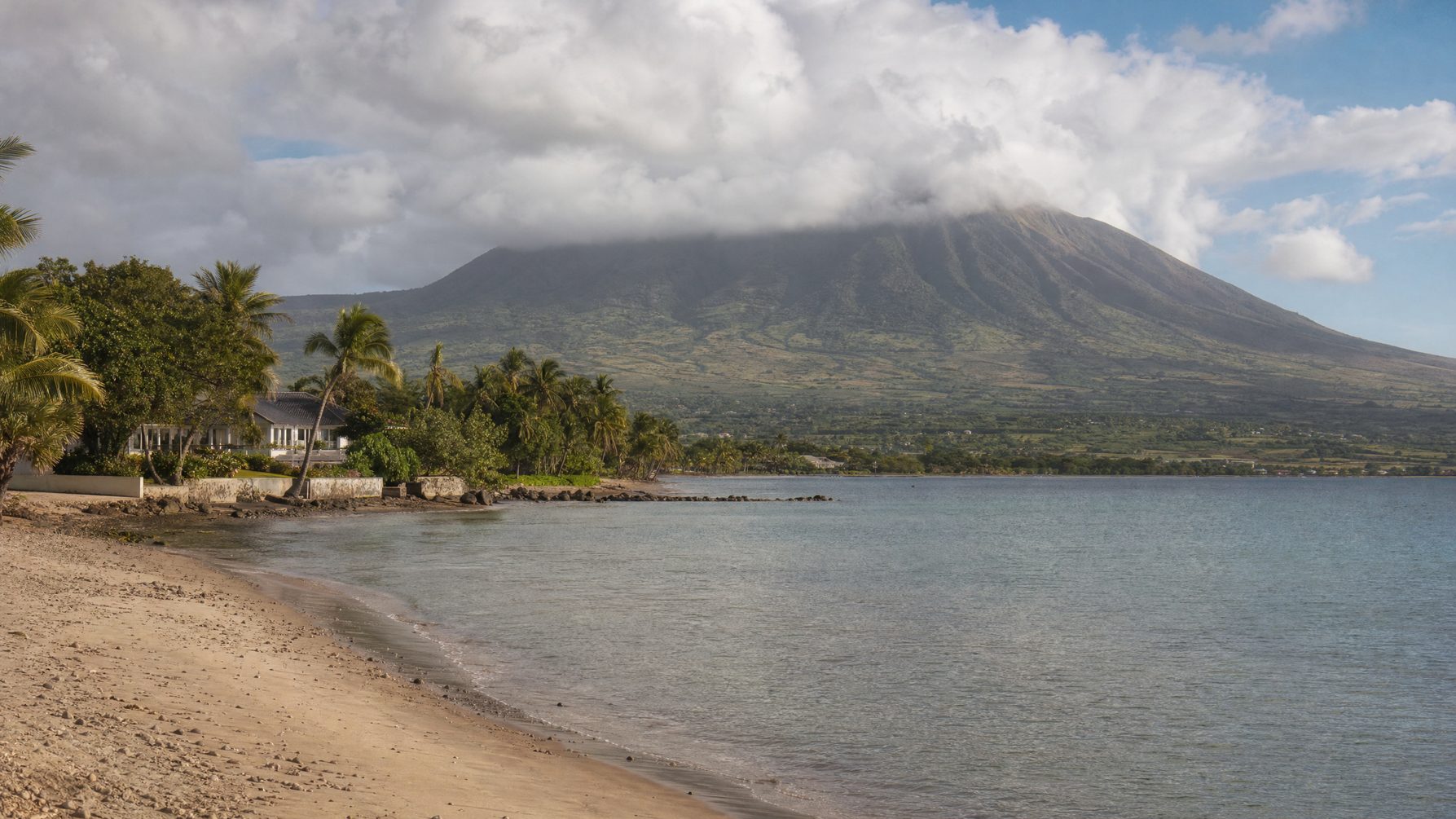 Nevis coastline and Mount Nevis under cloud