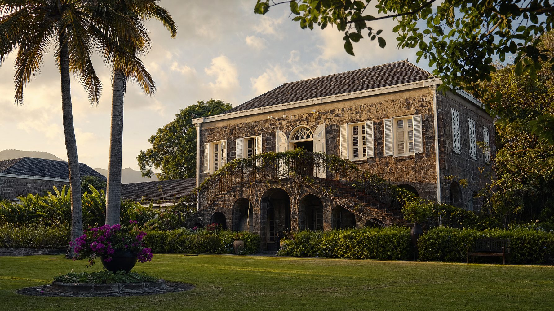 Old Caribbean plantation house and tropical garden